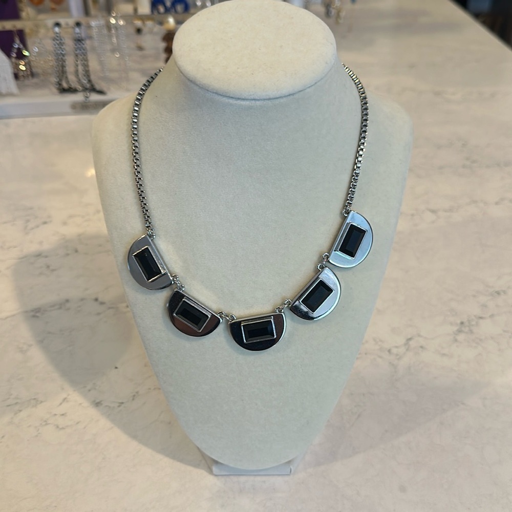 WHBM silver tone 1/2 black moon disc costume necklace